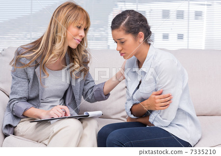 Psychotherapist helping a patient 7335210