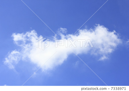 A white cloud floating in the blue sky A white cloud floating in the blue sky 7338971