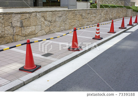 An annoyance parking prevention pylon in an office town 7339188