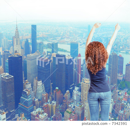 Back view young woman in jeans hands up. Rear view Back view young woman in jeans hands up. Rear view 7342391