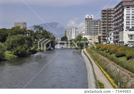 Asahi-bashi and Iwateyama crossing the Morioka / Kitakami River in early autumn 7344983