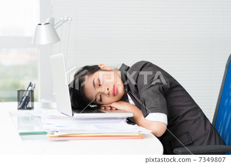Tired Asian businesswoman Tired Asian businesswoman 7349807