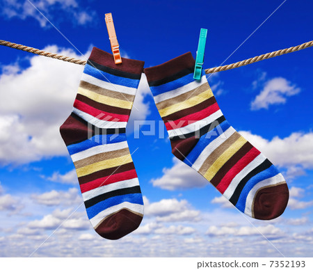 colorful socks hanging on clothespins colorful socks hanging on clothespins 7352193