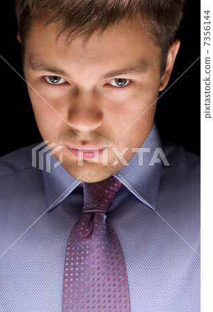 dark businessman portrait 7356144