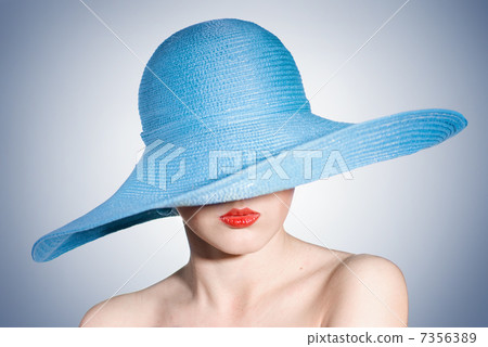 portrait of attractive elegant woman in blue hat 7356389
