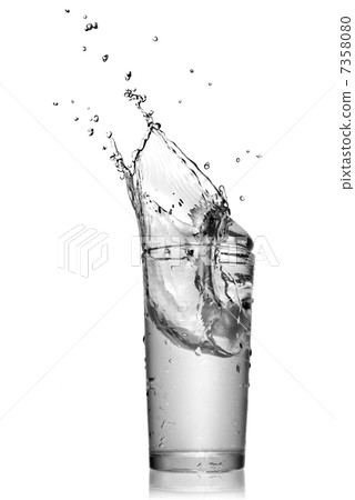 water splash in glass isolated on white water splash in glass isolated on white 7358080