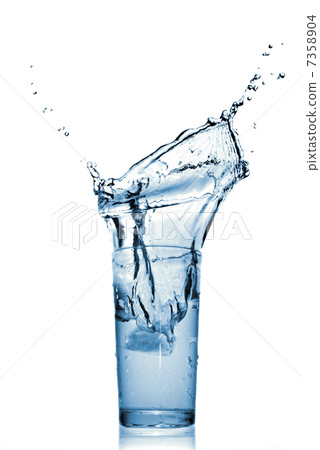 water splash in glass isolated on white water splash in glass isolated on white 7358904