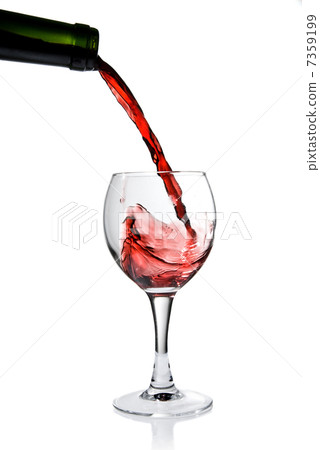 Pouring red wine in goblet isolated on white Pouring red wine in goblet isolated on white 7359199