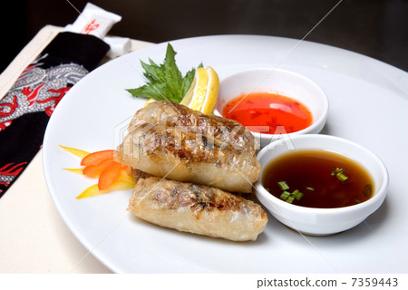 chinese rolls with meat on the plate 7359443