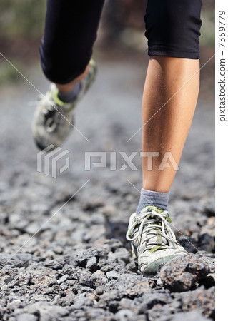 Trail running woman on mountain 7359779