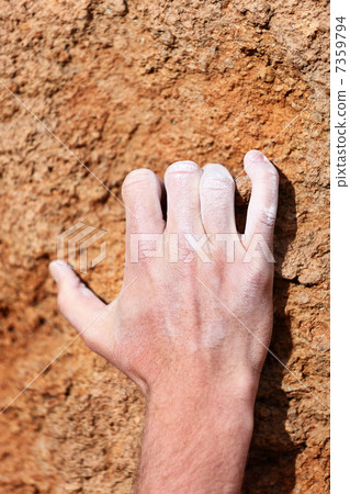 Climbing hand grip on rock Climbing hand grip on rock 7359794