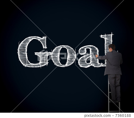 Businessman writing goal on a giant blackboard Businessman writing goal on a giant blackboard 7360188