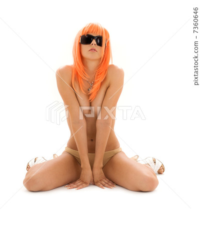 girl in shades with orange hair 7360646