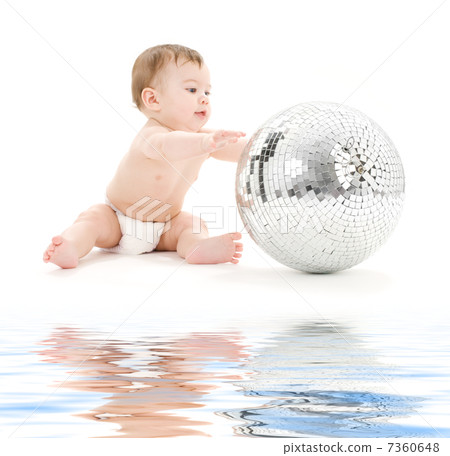 adorable baby boy with big disco ball 7360648