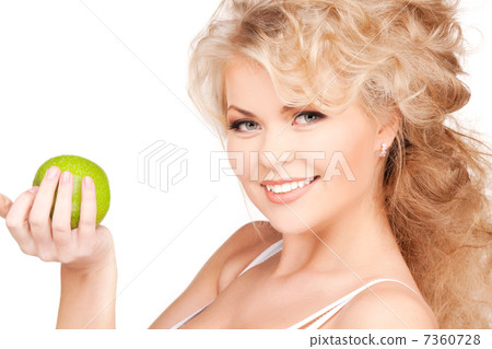young beautiful woman with green apple young beautiful woman with green apple 7360728