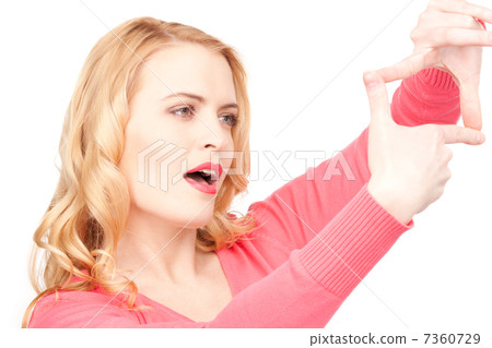 lovely woman creating a frame with fingers lovely woman creating a frame with fingers 7360729