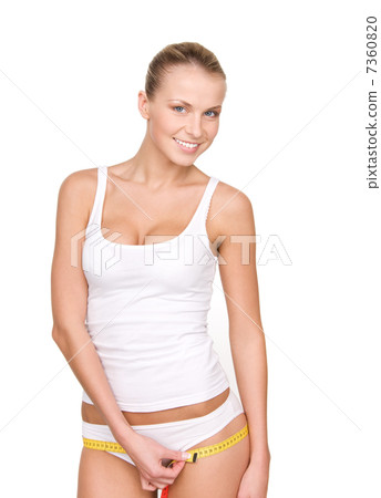 beautiful woman with measure tape 7360820