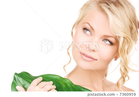 woman with green leaf 7360959