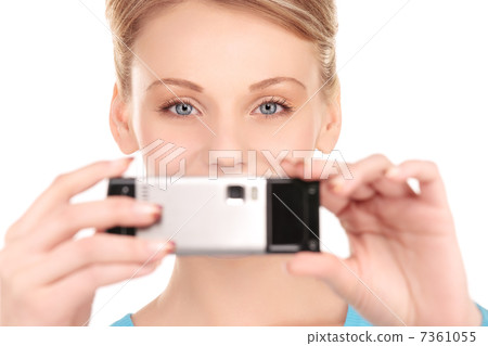 happy woman using phone camera 7361055