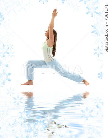 virabhadrasana warrior pose on white sand 7361171