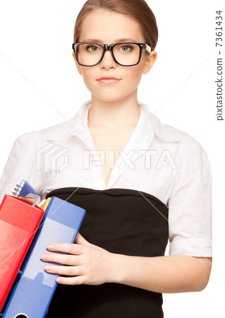 young attractive businesswoman with folders young attractive businesswoman with folders 7361434