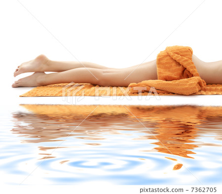 long legs of relaxed lady with orange towel on white sand #3 7362705