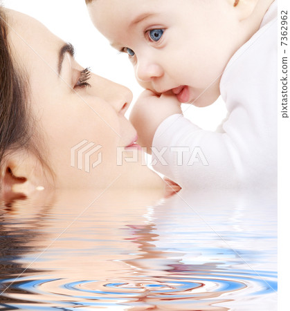 happy mother playing with baby boy in water #2 happy mother playing with baby boy in water #2 7362962