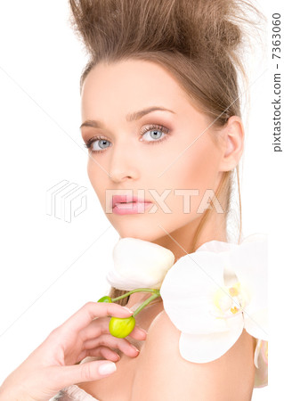 beautiful woman with white flower beautiful woman with white flower 7363060