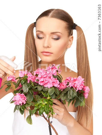 lovely housewife with flowers lovely housewife with flowers 7363163