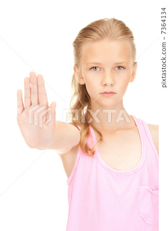 lovely girl showing stop sign lovely girl showing stop sign 7364134
