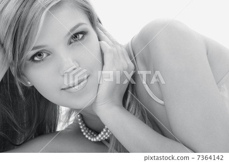monochrome picture of mysterious blonde in pearls monochrome picture of mysterious blonde in pearls 7364142