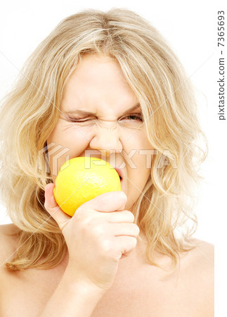 lovely blond biting lemon 7365693