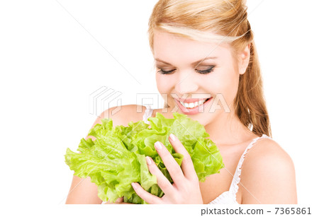 happy woman with lettuce 7365861