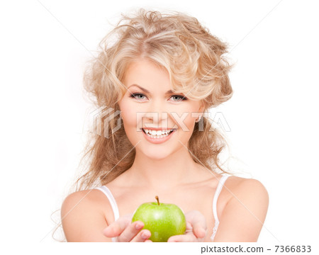 young beautiful woman with green apple young beautiful woman with green apple 7366833