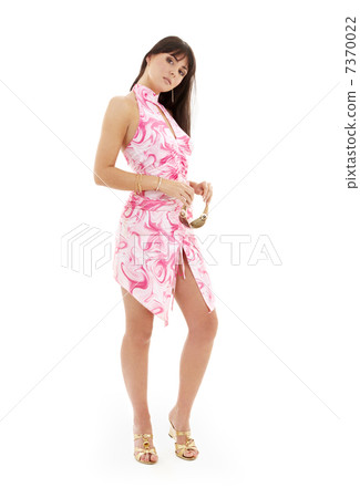 lovely girl in pink dress and golden platform shoes 7370022