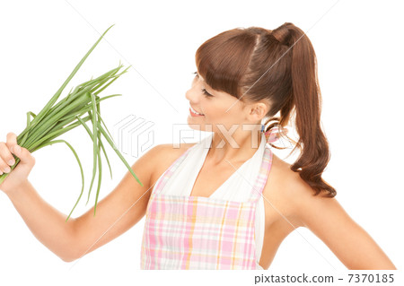 beautiful housewife with spring onions over white beautiful housewife with spring onions over white 7370185