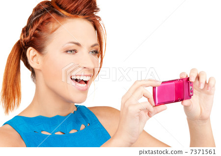 happy woman using phone camera 7371561