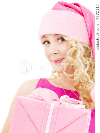 cheerful santa helper girl with gift box cheerful santa helper girl with gift box 7372113