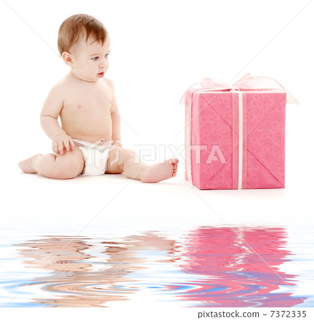 baby boy in diaper with big gift box baby boy in diaper with big gift box 7372335