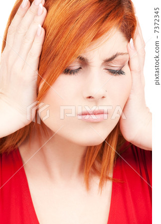 unhappy redhead woman unhappy redhead woman 7372345