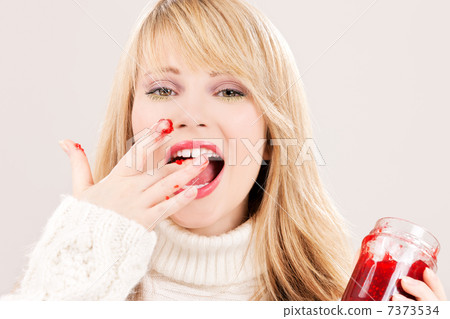 happy teenage girl with raspberry jam happy teenage girl with raspberry jam 7373534