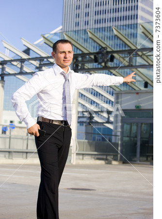 businessman in a front of a building site 7373604