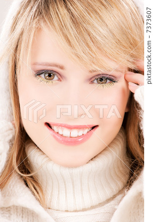 lovely teenage girl in hoodie 7373607