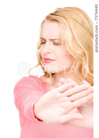 young woman making stop gesture young woman making stop gesture 7374440