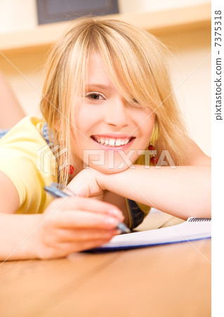teenage girl with notebook and pen teenage girl with notebook and pen 7375318