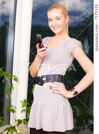 lovely woman with cell phone lovely woman with cell phone 7375328