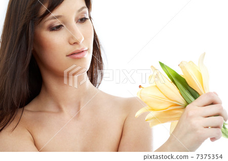 happy brunette with yellow lily flowers #2 7375354