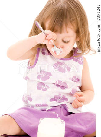 little girl with yoghurt 7376245