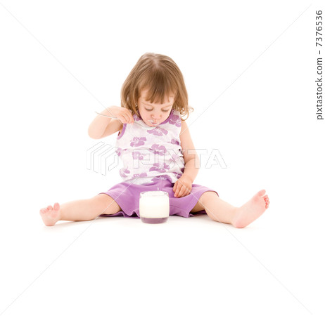 little girl with yogurt 7376536