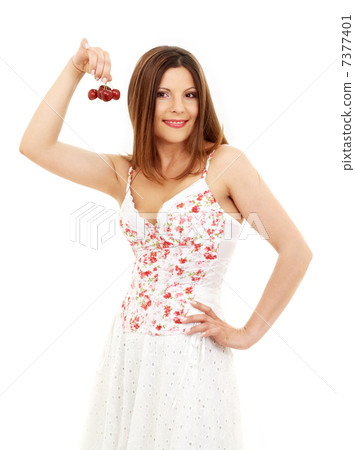 beautiful brunette girl holding cherries 7377401